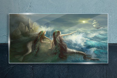 Mermaids on the seashore Glass Print