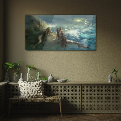 Mermaids on the seashore Glass Print
