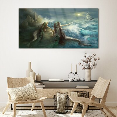 Mermaids on the seashore Glass Print