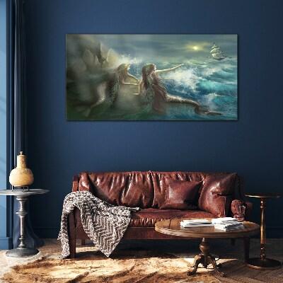 Mermaids on the seashore Glass Print