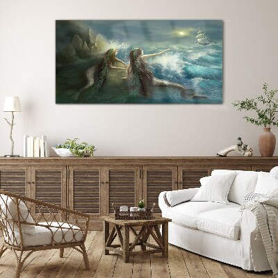 Mermaids on the seashore Glass Print