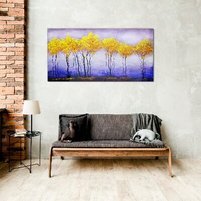 Golden trees in a purple landscape Glass Print