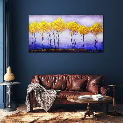 Golden trees in a purple landscape Glass Print