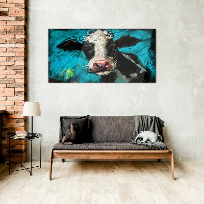 Portrait of a cow on a blue background Glass Wall Art