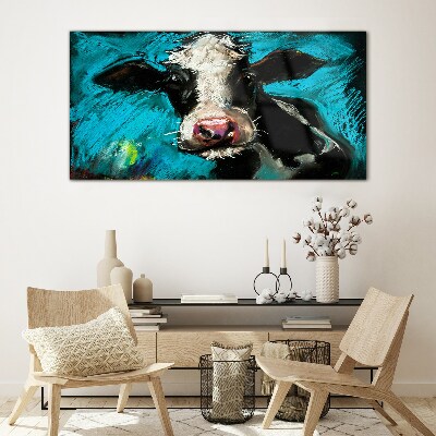 Portrait of a cow on a blue background Glass Wall Art