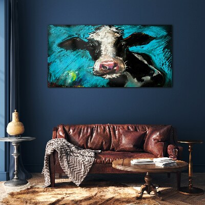 Portrait of a cow on a blue background Glass Wall Art