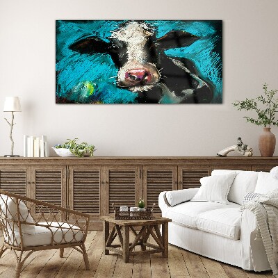 Portrait of a cow on a blue background Glass Wall Art