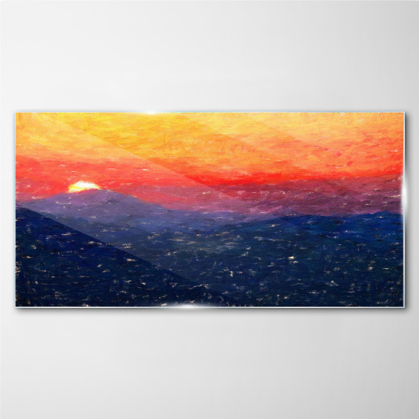 Sunset over a mountain landscape Glass Print