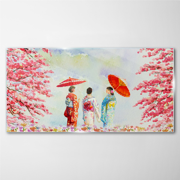 A spring walk under the blooming trees Glass Print