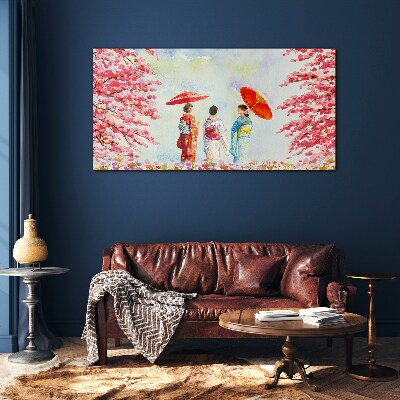 A spring walk under the blooming trees Glass Print