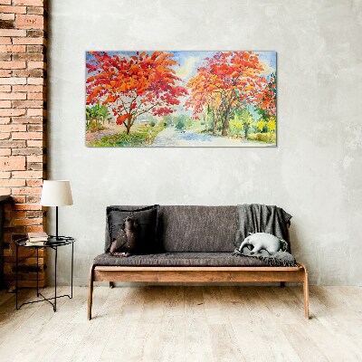 Autumn trees in the color of fire Glass Print