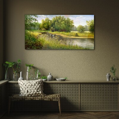A peaceful landscape by the river Glass Print