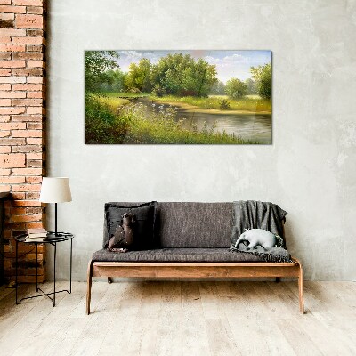 A peaceful landscape by the river Glass Print