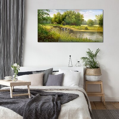 A peaceful landscape by the river Glass Print