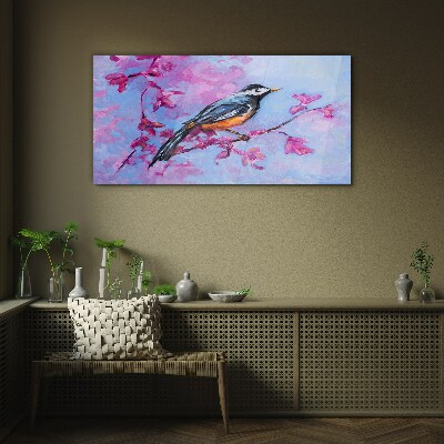Spring bird on pink branches Glass Wall Art