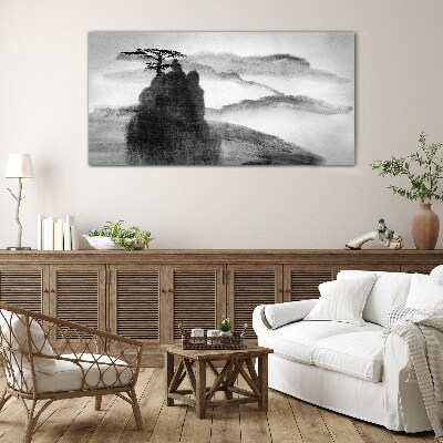 A lonely tree on a rocky mountain Glass Wall Art
