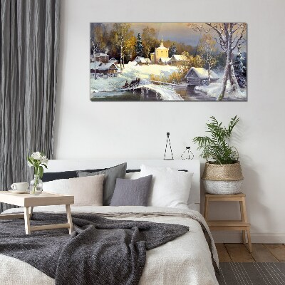 Winter landscape with a village church Glass Print
