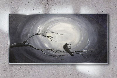 A lonely bird on a branch Glass Wall Art