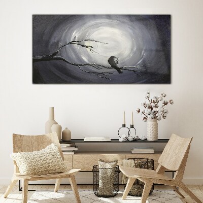 A lonely bird on a branch Glass Wall Art