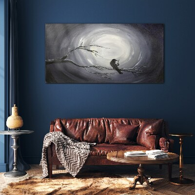 A lonely bird on a branch Glass Wall Art