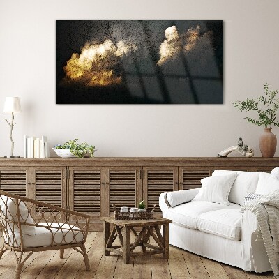 Golden clouds on a dark background Glass Print