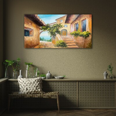 The charming streets of a seaside village Glass Wall Art