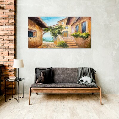 The charming streets of a seaside village Glass Wall Art