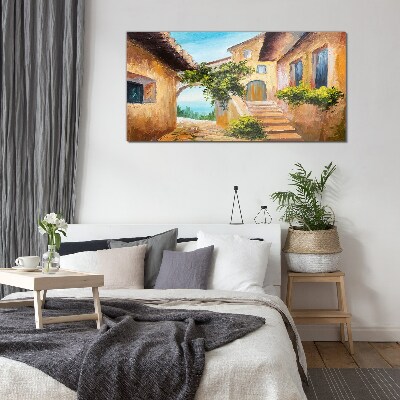 The charming streets of a seaside village Glass Wall Art