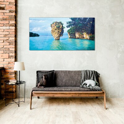 A quiet bay with a high rock Glass Print
