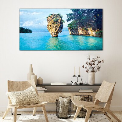 A quiet bay with a high rock Glass Print
