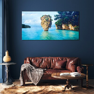 A quiet bay with a high rock Glass Print