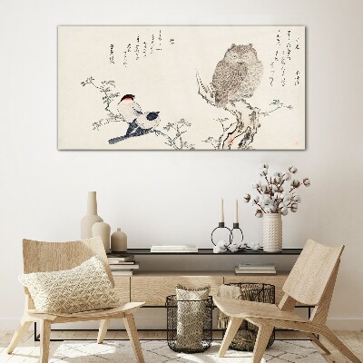 Birds and an owl on a branch Glass Wall Art