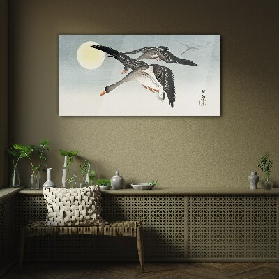 Geese in flight under the full moon Glass Wall Art