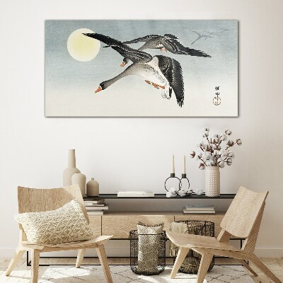 Geese in flight under the full moon Glass Wall Art