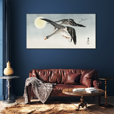 Geese in flight under the full moon Glass Wall Art