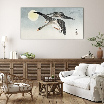 Geese in flight under the full moon Glass Wall Art