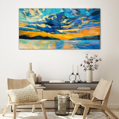 Sunset over a calm lake Glass Print
