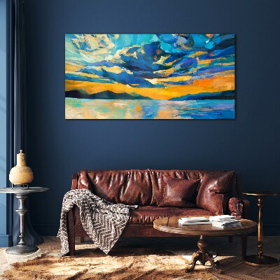 Sunset over a calm lake Glass Print