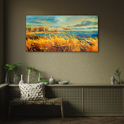 Golden grass over blue water Glass Print