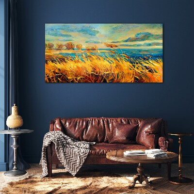 Golden grass over blue water Glass Print