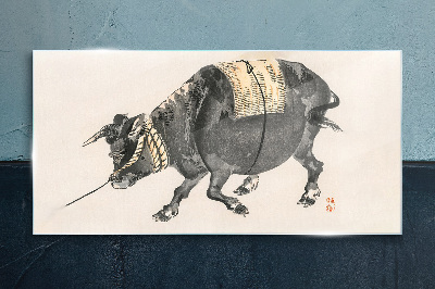 Horned cow on the move Glass Wall Art
