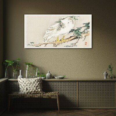 Falcon on a branch Glass Print