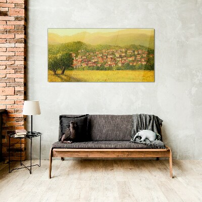 A sunny village among the hills Glass Print