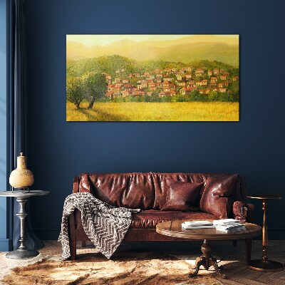 A sunny village among the hills Glass Print