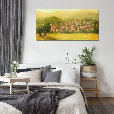 A sunny village among the hills Glass Print