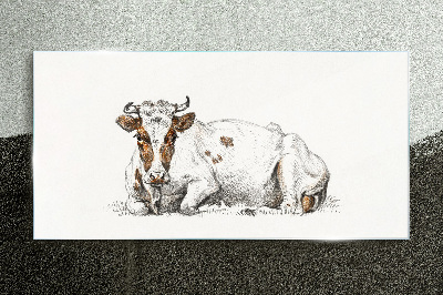 A calm cow in the meadow Glass Print