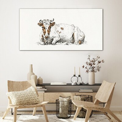 A calm cow in the meadow Glass Print