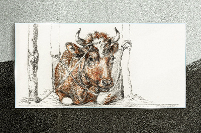 A peaceful cow in a rural setting Glass Print