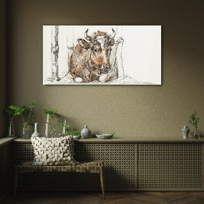 A peaceful cow in a rural setting Glass Print