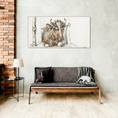 A peaceful cow in a rural setting Glass Print